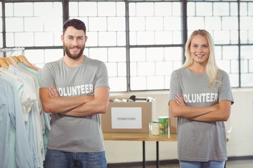 Obraz premium Portrait of volunteers with arms crossed 