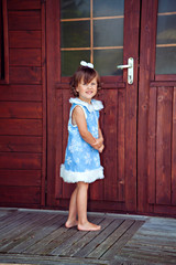 Little girl in snowflake costume