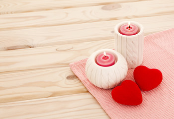 Love story concept. Close-up view of red burning candle