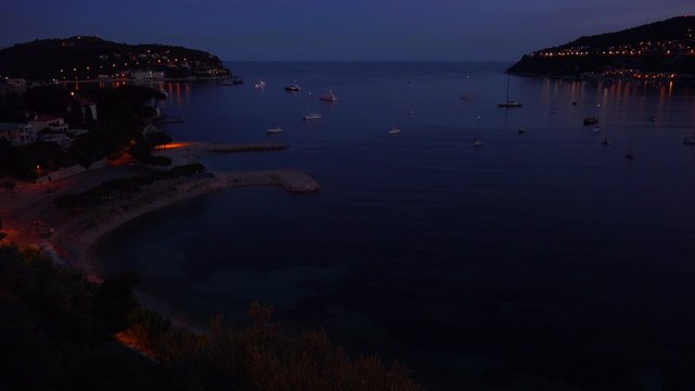 High angle over France's amazing Cote D'Azur at night.