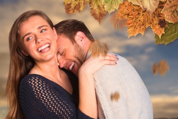 Composite image of close up of happy young couple
