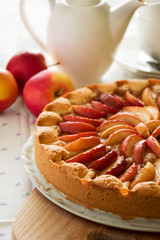Homemade apple cake on wooden board 