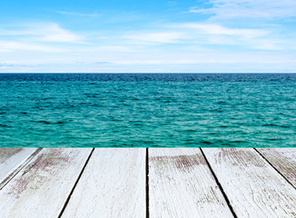 Fototapeta premium Seascape with sea and sky, white wooden plank in perspective