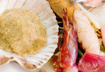 fresh seaffod appetizer over plate at restaurant