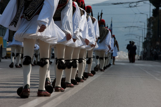 Legs and kilts of Evzones, goose-stepping on Vassilisis Sofias avenue, Syntagma, central Athens, Greece