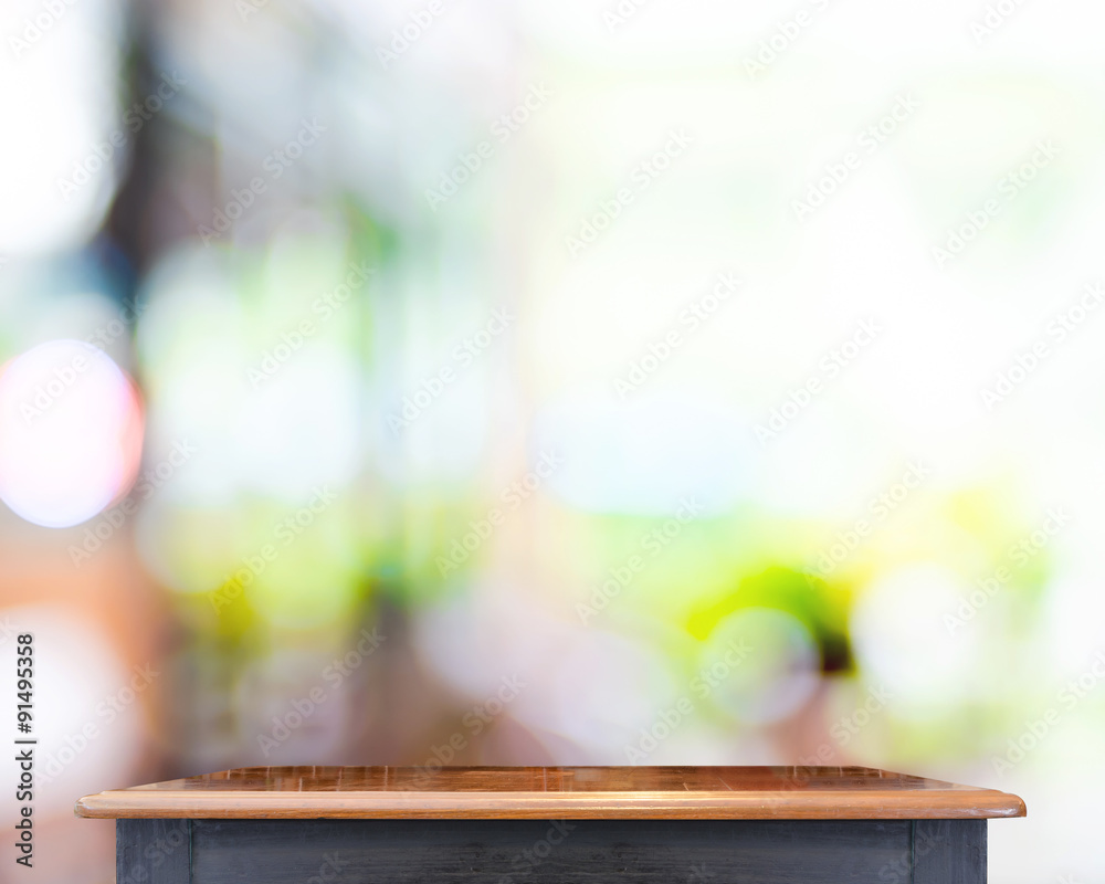 Poster empty black vintage table top at store blurred background with b