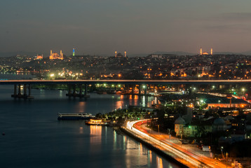Fototapeta na wymiar Night skyline of Istanbul with mosquees in the background