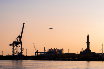 Obraz premium Skyline of harbor of Genoa during the sunset