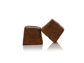 Chocolate pieces on white background