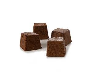 Chocolate pieces on white background