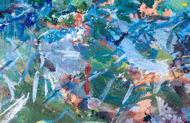 Abstract background of oil smeared paint on an artist's palette