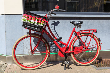 Fototapeta na wymiar Red bicycle in Belgium