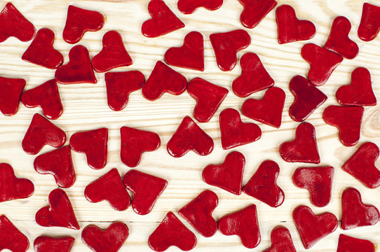 hearts on a wooden table - background