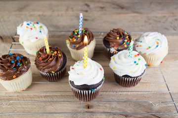 Homemade white and chocolate cupcakes.