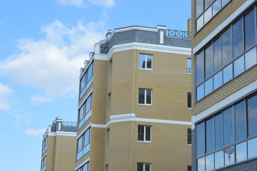 facade of an apartment building against the sky