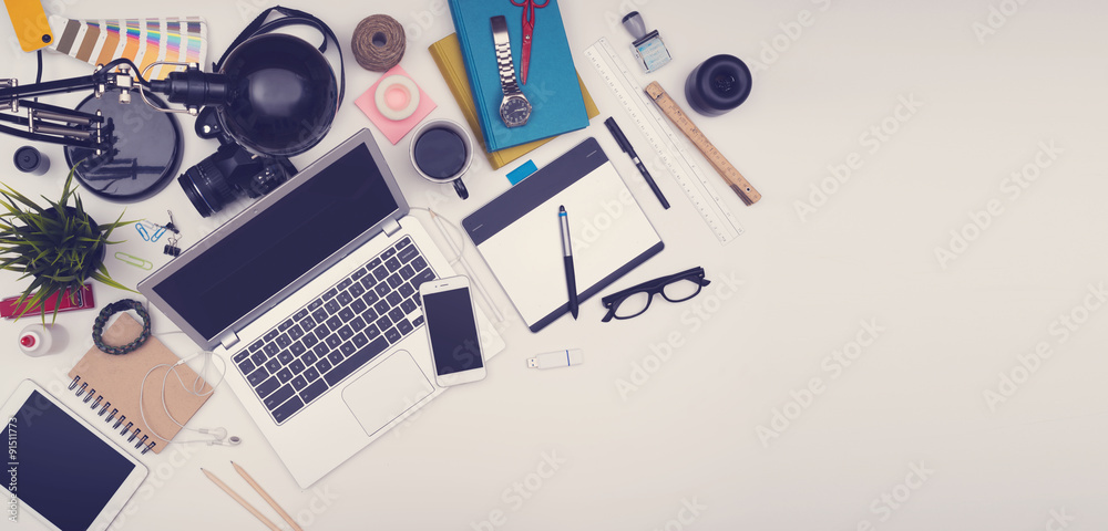 Wall mural top view header image of messy desk