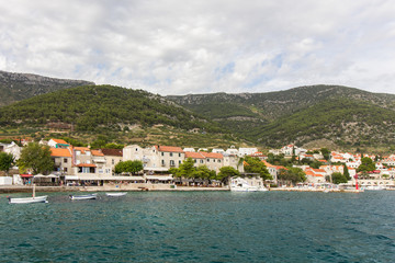 View of Bol town from the sea at the Brac island in Croatia.