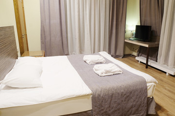 Motel room with queen-size bed