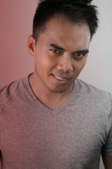 Fototapeta premium Young filipino smiling