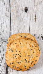 Japanese rice crackers, locally known as senbei over wooden background