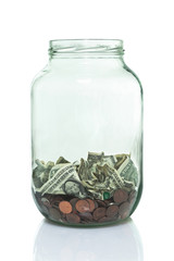 Glass jar with some money in the bottom