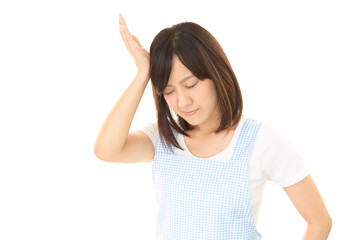 疲れた表情の主婦