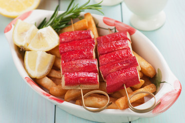 Crab sticks skewer and french fries