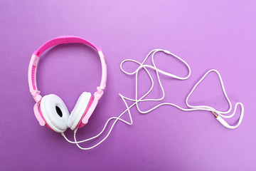 Headphones on purple background