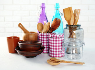 Composition with different utensils on wooden wooden table