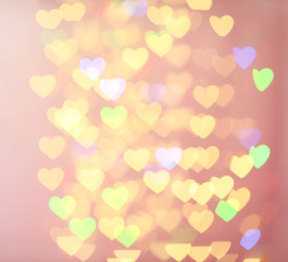 Festive background of lights in hearts shape