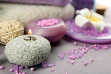 Obraz na płótnie Canvas Spa treatments on colorful background. Lavender spa concept