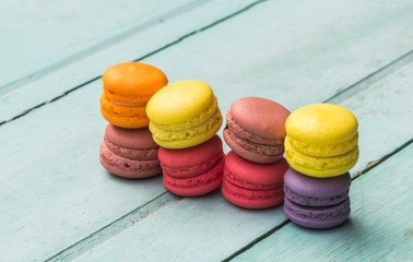 Macarons buttercream on the old  wood.