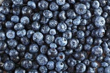 Heap of tasty ripe blueberries close up