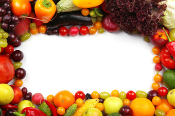 Heap of fruits and vegetables isolated on white