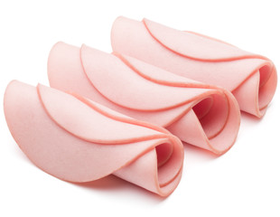 cooked boiled ham sausage or rolled bologna slices isolated on w