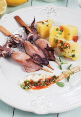 Grilled squid on skewer
