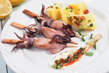 Grilled squid on skewer