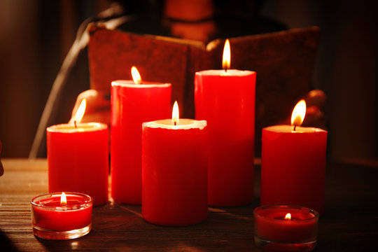 Witch - fortune teller with candles close up