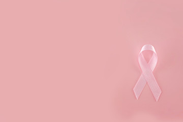 Satin ribbon sign on pink background