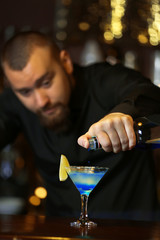 Bartender making cocktail