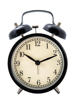 old fashioned alarm clock on white backgrounds
