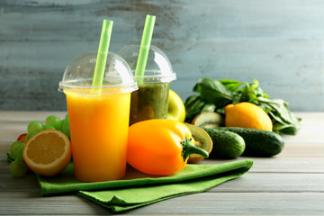 Fresh juice mix fruit, healthy drinks on wooden table, on bright background