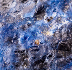 sodalite mineral with inclusions close up
