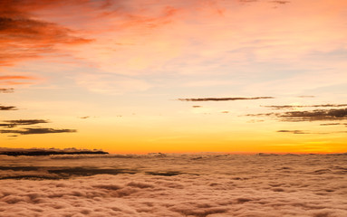 Dramatic sunrise over valley of fog