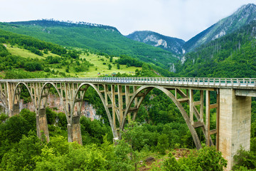 Fototapeta na wymiar Mountain landscape, Montenegro. Durdevica Tara arc bridge 