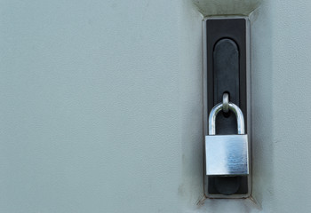 padlock locked on telephone exchange cabinet