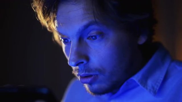 man hacking tablet computer security threath touchscreen close-up