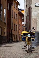 Fototapeta na wymiar Postman's Bike, Gamla Stan (Old town), Stockholm, Sweden