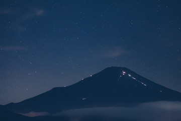 Fototapeta na wymiar Night landscape at Mountain Fuji and star in summer season