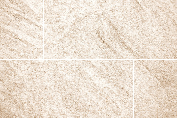 Brown stone floor tile seamless background and texture
